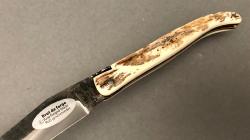 Couteau Laguiole en Aubrac 12 cm brut de forge croute d'ivoire de mammouth